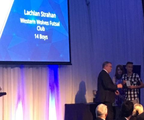 Lachlan receiving his award